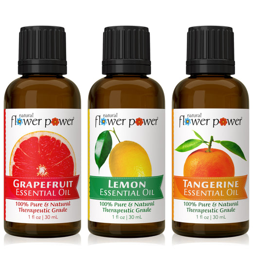 Natural Flower Power Essential Oils Variety 3-Pack — Pink Grapefruit, Lemon, and Tangerine 1 fl oz amber dropper bottles.