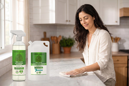 Free & Clear All-Purpose Cleaner + 7X Refill Bundle while she wipes the kitchen counter