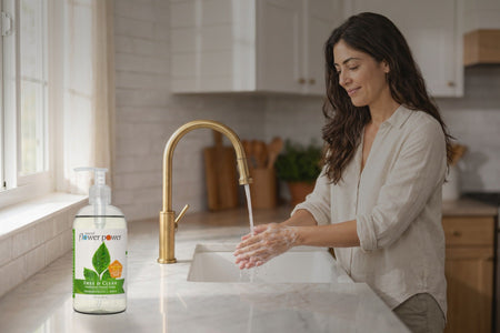 Free & Clear Liquid Hand Soap while she washes her hands at the kitchen sink