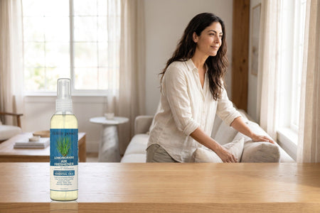 Lemongrass Air Freshener on a wooden console in a bright living room