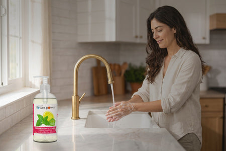 Peppermint & Lemon Liquid Hand Soap while she washes her hands at the kitchen sink