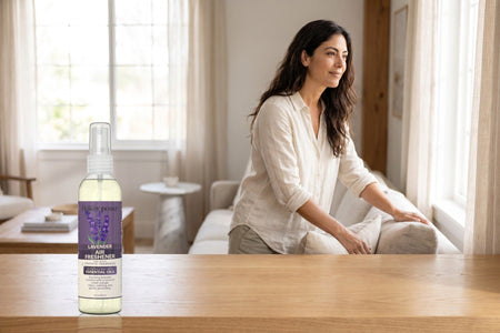 Lavender Air Freshener on a wooden console in a bright living room