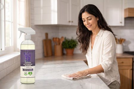 Lavender All-Purpose Cleaner Concentrate while she wipes the kitchen counter