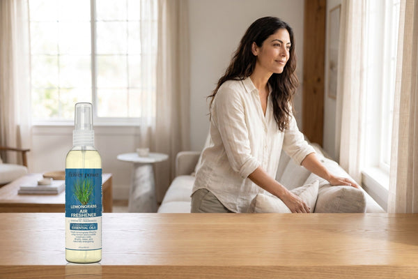 Lemongrass Air Freshener on a wooden console in a bright living room