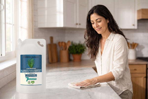 Lemongrass All-Purpose Cleaner 7X Refill while she wipes the kitchen counter
