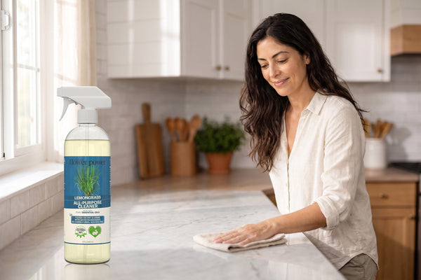 Lemongrass All-Purpose Cleaner Concentrate while she wipes the kitchen counter