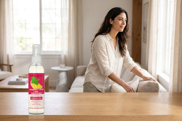 Peppermint & Lemon Air Freshener on a wooden console in a bright living room