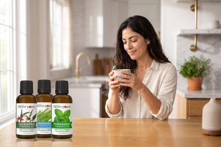 Variety Pack Essential Oils (Eucalyptus, Lemongrass, Peppermint) on a wooden table at breakfast